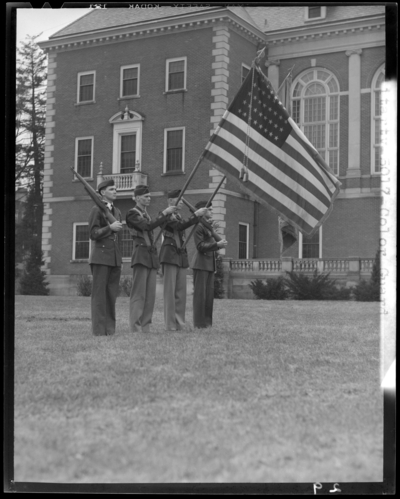 Military color guard standing in group (1943 Kentuckian)                             (University of Kentucky)