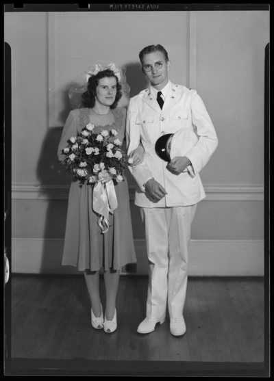 L.T.C.B. Bush (or Brush); wedding; couple standing                             together