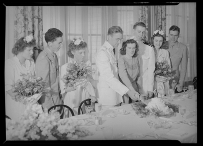 L.T.C.B. Bush (or Brush); wedding; couple standing together                             cutting cake