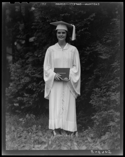 Kentucky Female Orphan School, 201-203 West Short; woman in cap                             and gown holding diploma