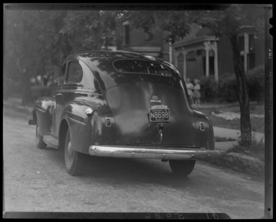 Lexington Yellow Cab Company, 150 North Limestone; wrecked car of                             C. C. Moore