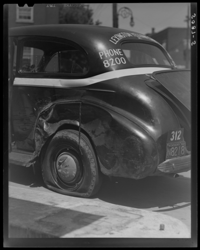 Lexington Yellow Cab Company, 150 North Limestone; wrecked                             cab