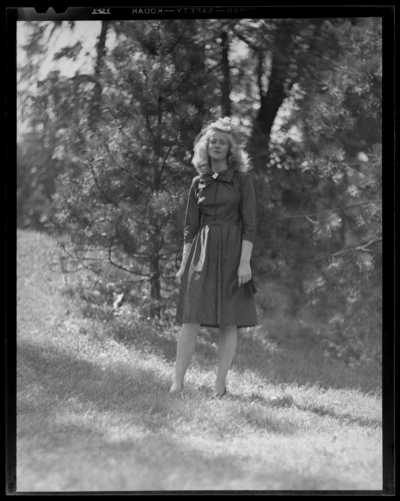 Loom & Needle, 170 Esplanade (clothing); woman standing                             in grass
