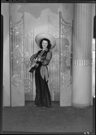 Kentucky Houses of Reform; woman playing guitar on                             stage