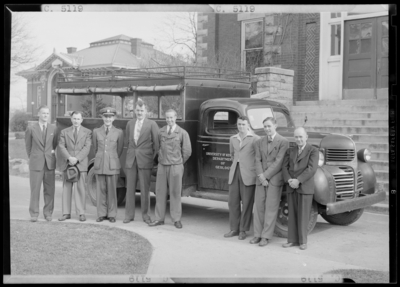 Sigma Gamma Epsilon (1944 Kentuckian) (University of Kentucky) ;                             group standing in front of Department of Geology vehicle