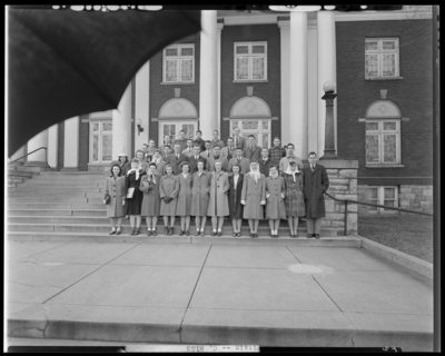 Pitkin Club (1944 Kentuckian) (University of Kentucky); group                             standing on steps of building