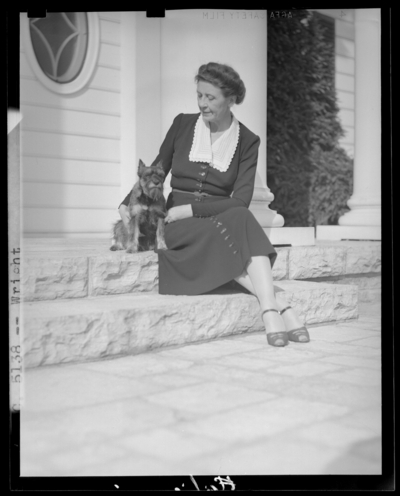Mrs. Warren Wright with dog