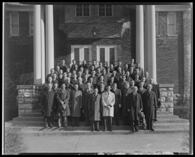 College of Bible (North Broadway, Third (3rd) and Fourth (4th)                             Street); group standing on steps