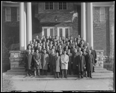 College of Bible (North Broadway, Third (3rd) and Fourth (4th)                             Street); group standing on steps