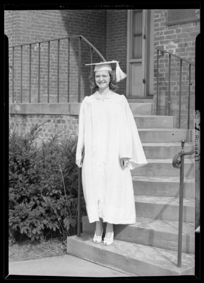 Kentucky Female Orphan School, 201-203 West Short; individual                             standing with diploma; J. Russell