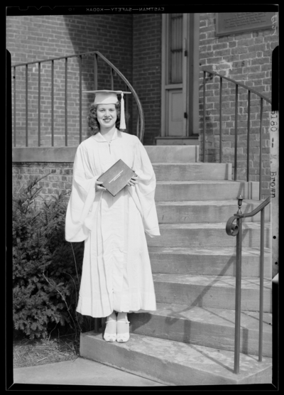 Kentucky Female Orphan School, 201-203 West Short; individual                             standing with diploma; M. Brown