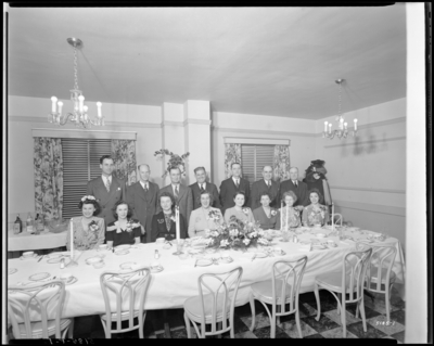 Park & Tilford Distillery Company banquet ; group                             gathered at table