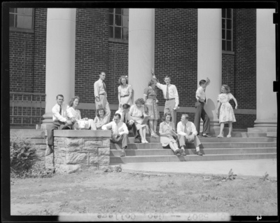 Georgetown College; students standing on steps of                             building