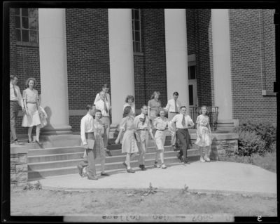 Georgetown College; students standing on steps of                             building