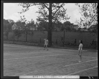 Georgetown College; students playing tennis