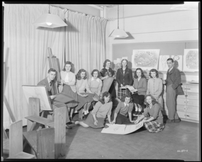 Art Club, University of Kentucky; Biological Building; interior;                             students gathered around easel