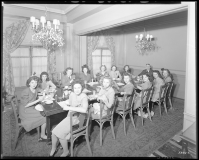 D.B. Scobee; Colonial Room, Lafayette Hotel; women gathered                             around banquet table; group portrait
