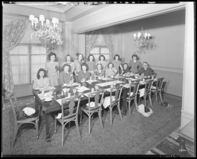 D.B. Scobee; Colonial Room, Lafayette Hotel; women gathered                             around banquet table; group portrait