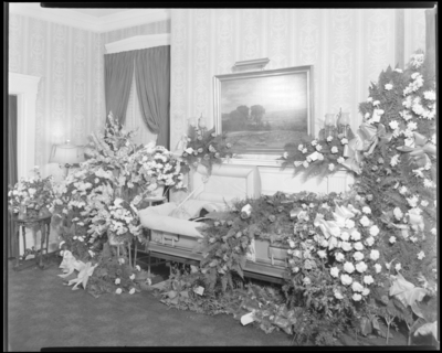 Joseph H. Stillwell; corpse; open casket surrounded by                             flowers