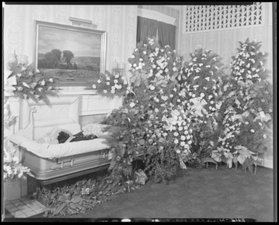 Joseph H. Stillwell; corpse; open casket surrounded by                             flowers