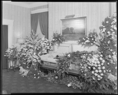 Joseph H. Stillwell; corpse; open casket surrounded by                             flowers