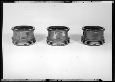 Aeronautical Research Lab, University of Kentucky; close-up view                             of nine (9) pistons; airplane engine parts