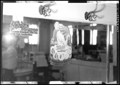 O.K. Barber Shop, 118 South Upper; interior; shampoo                             advertisement on mirror; 