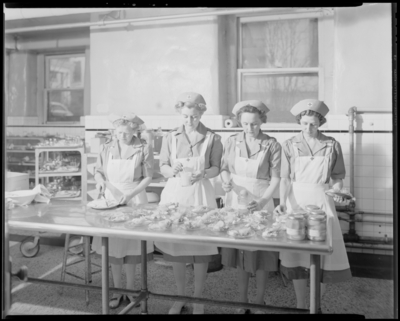 Good Samaritan Hospital, 310-330 South Limestone; four nurses                             preparing meals