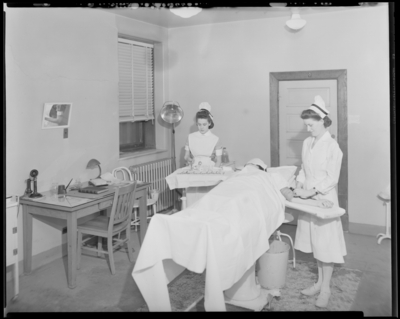 Good Samaritan Hospital, 310-330 South Limestone; two nurses                             working on patient