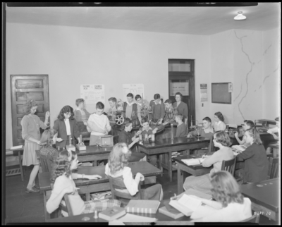 Science Class, Garth High School (Georgetown); lecture room;                             interior; students gathered around science demonstrations