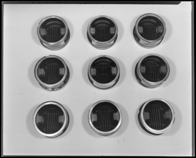 Aeronautical Research Lab, University of Kentucky; close-up view                             of 9 (nine) aircraft engine pistons
