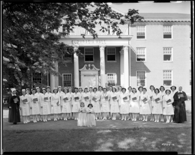 St. Joseph's Hospital, 544 West Second (2nd) Street; Cadet                             Nurses (graduation); exterior; group portrait