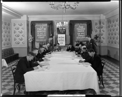 Chevrolet Motor Division (1625 West Hill, Louisville); Red Room,                             Lafayette Hotel; interior; meeting; men gathered around                             table