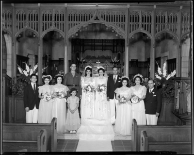 Dughman & Harb; double wedding; Church of the Good                             Shepherd (East Main); interior; wedding parties standing in front of                             alter; group portrait