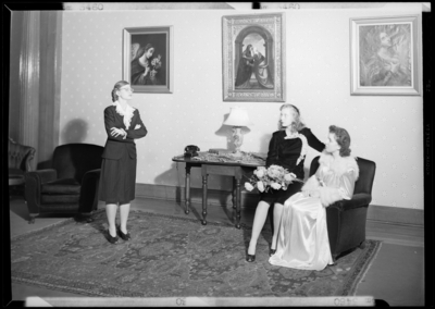 Cardome Academy; bookshelf; women sitting in room