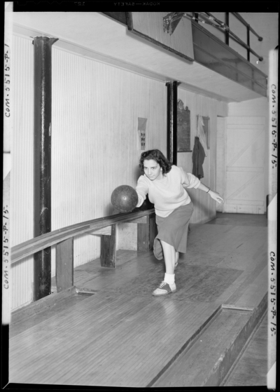 Georgetown College; bowling alley; interior; woman                             bowling