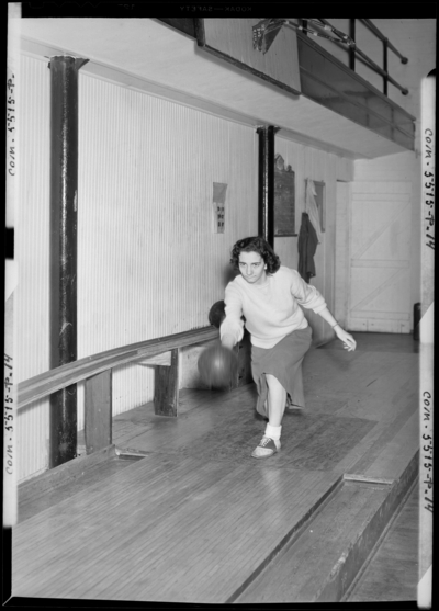 Georgetown College; bowling alley; interior; woman                             bowling