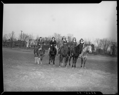 Georgetown College; group on horseback