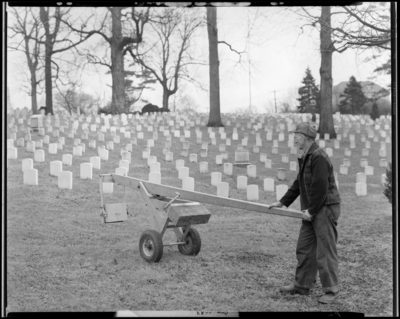 Tombstone puller; Lexington Cemetery; man operating tombstone                             puller