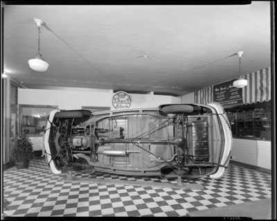 L.R. Cooke Chevrolet Company, 255 East Main; interior; 1946 Nash                             automobile on display; car displayed on its side
