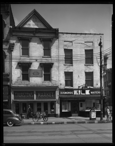 Hutchinson Building; Kirk Jewelry Company, 301 West Main;                             Thurston's Market, 305 West Main; building; exterior