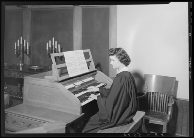 Georgetown College; interior; woman playing the organ