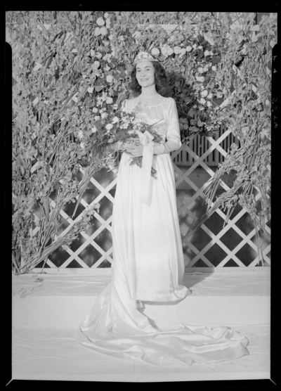 Georgetown May Queen; Queen holding a bouquet of                             flowers