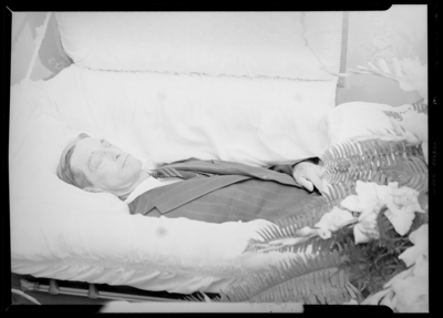 Mr. W.J. Ham; corpse; open casket surrounded by flowers; close-up                             view of upper torso