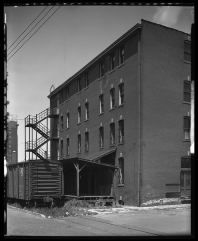 Tunis Building, Evans Products (Heating), 260-268 East Main;                             photographs requested by Sears & Roebuck Company, 213 East Main;                             building; exterior; rear view