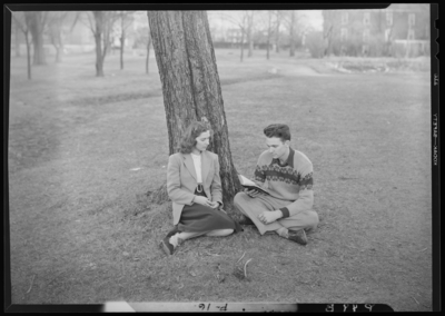Georgetown College; Prayer Date; exterior; man and woman sitting                             on the grass