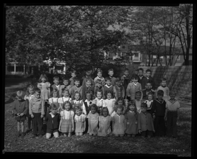 St. Catherine's Academy (Sisters of Charity of Nazareth),                             240 North Limestone; first grade class (1st grade, grade 1); exterior;                             group portrait