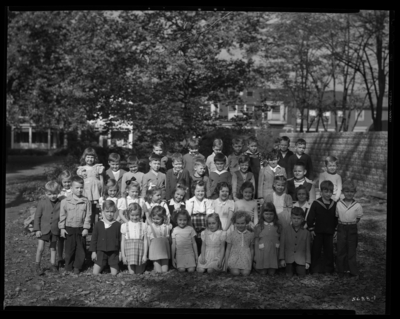 St. Catherine's Academy (Sisters of Charity of Nazareth),                             240 North Limestone; first grade class (1st grade, grade 1); exterior;                             group portrait