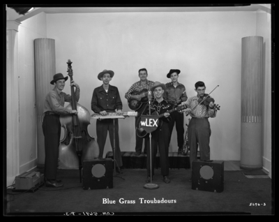 Lucian Gayheart; band, Blue Grass Troubadours; interior; band                             performing
