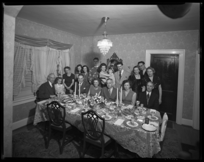 R.J. Long (Lafayette Studios); Thanksgiving Dinner; group                             gathered around the dinner table; group portrait